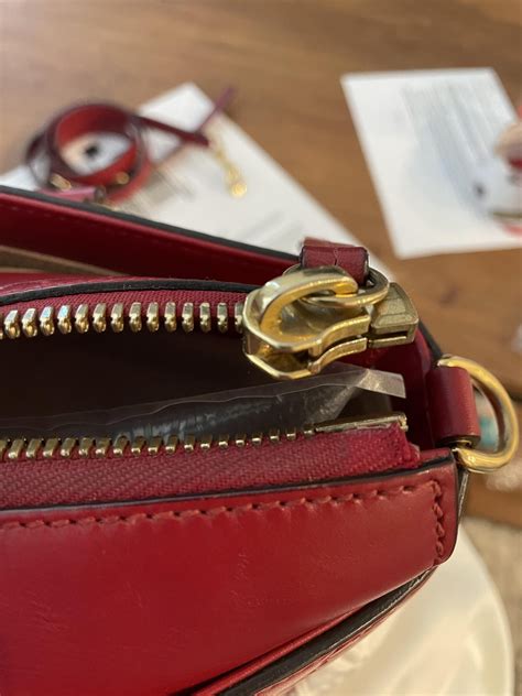 gucci purse zipper repair|Gucci repair shop near me.